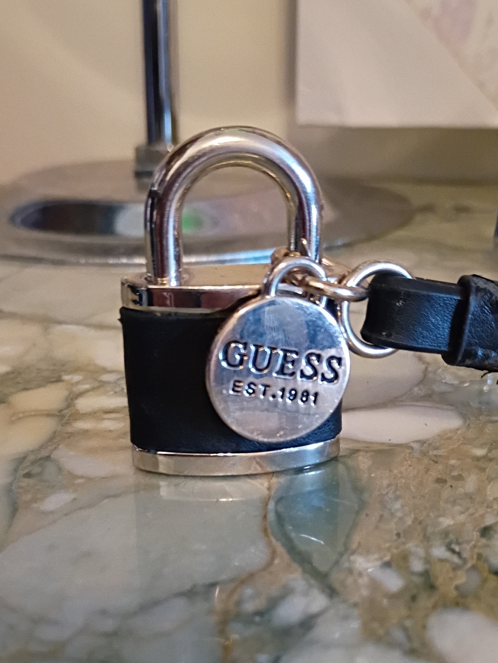 GUESS Black Leather Padlock Key Charm with Silver-Tone Logo Disc